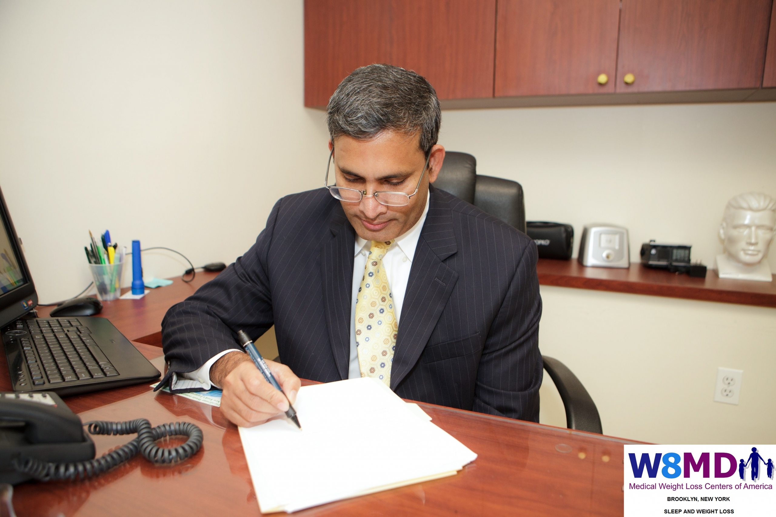 Physician checking cardiovascular considerations before weight loss