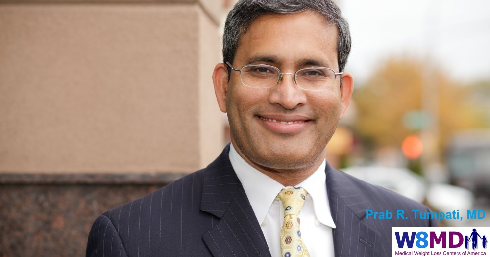 Physician reviewing retatrutide clinical research